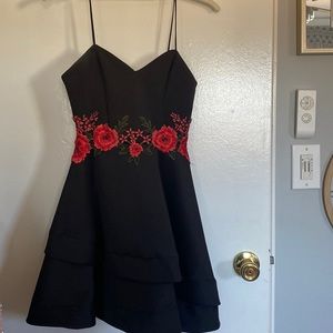 Dress in black with roses